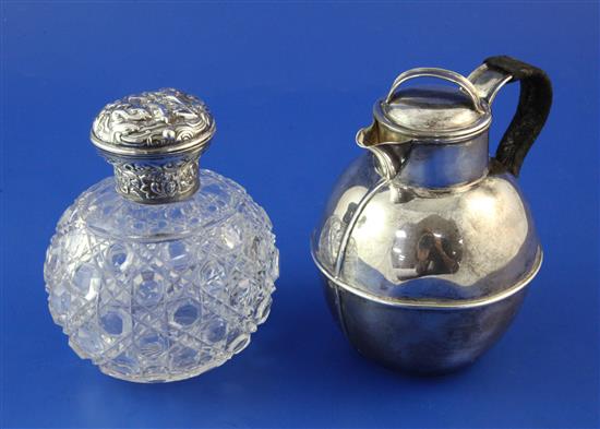 A late Victorian silver Guernsey milk can and a silver mounted cut glass ovoid scent bottle, 4.75in.